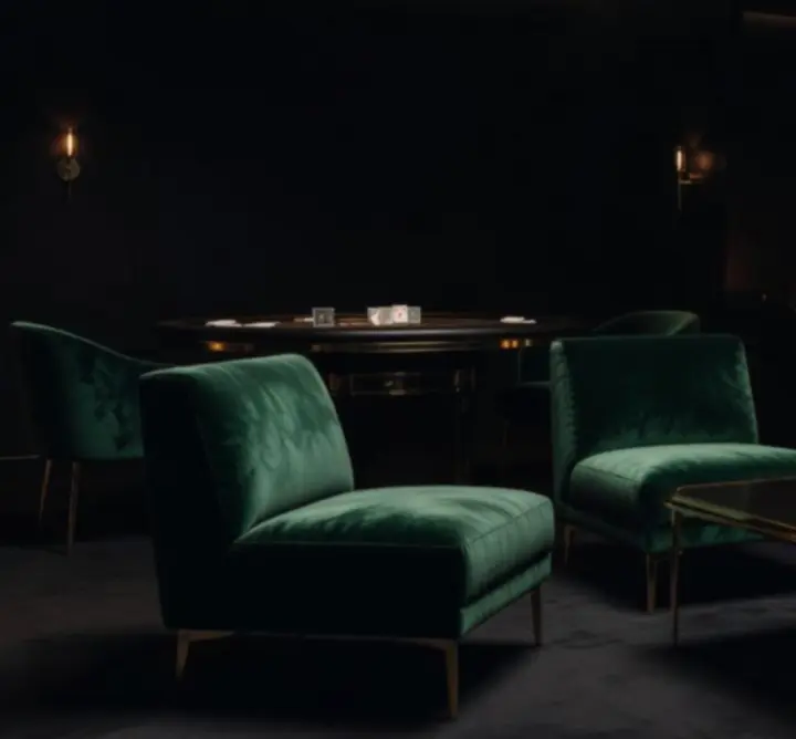 Cinematikus hangulatú, félhomályos lounge tér smaragdzöld és borvörös fényekkel